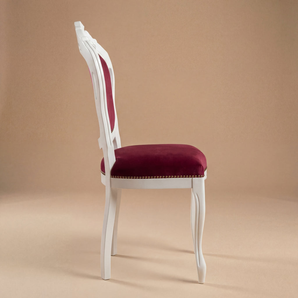 Side profile showing elegant cabriole legs and white satin finish of the Louis Philippe style chair.