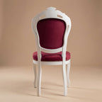 Solid wood backrest of white Louis Philippe dining chair showing sturdy construction and finish.