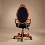 Rear view of the Meggio chair showing the solid wood oval back panel and sturdy construction.